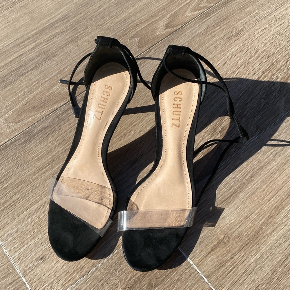 Schutz high heel sandal, with pvc strap.